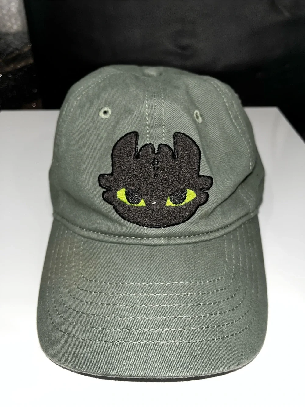 Dreamworks Olive Green Cap with Black Embroidered Dragon Face